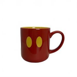 This is a red ceramic Disney Mickey Mouse pants coffee mug.